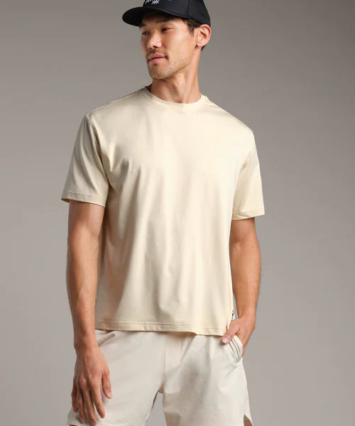 RHONE-Mensshortsleeve_BaseTraining_Linen_db853fd5-ae9b-4284-88d9-f3778d0c4899.webp
