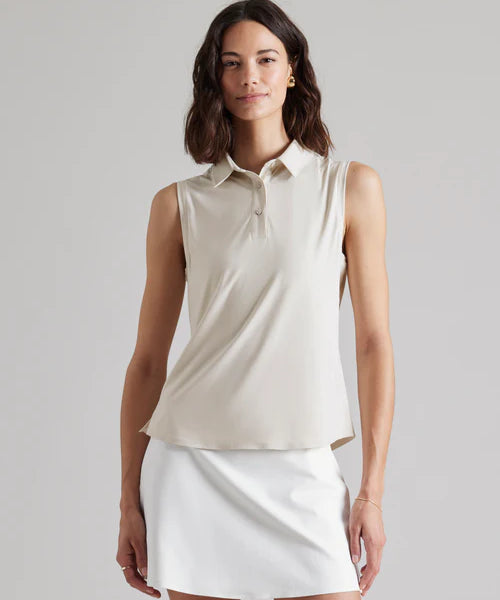 RHONE-womenssleevelesspolo_CoursetoCourt_Sand.webp